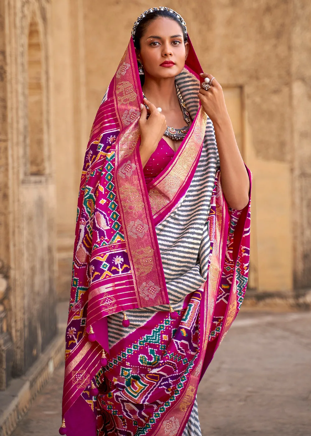 Magenta Purple Designer Patola Silk Saree with Zari Border & Stone work