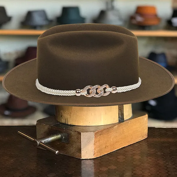 Wide-Brim Green Cowboy Hat with Elegant Silver Rope Band and Buckle