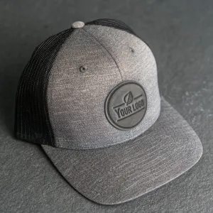 Your Logo on a Leather Patch Performance Style Trucker Hat - Circle Patch